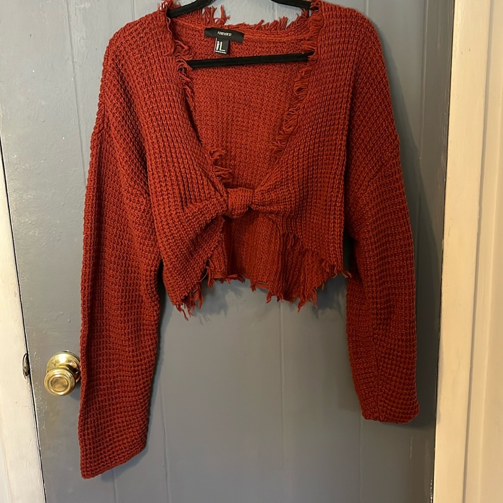 Waffle knit cropped sweater with a tie front